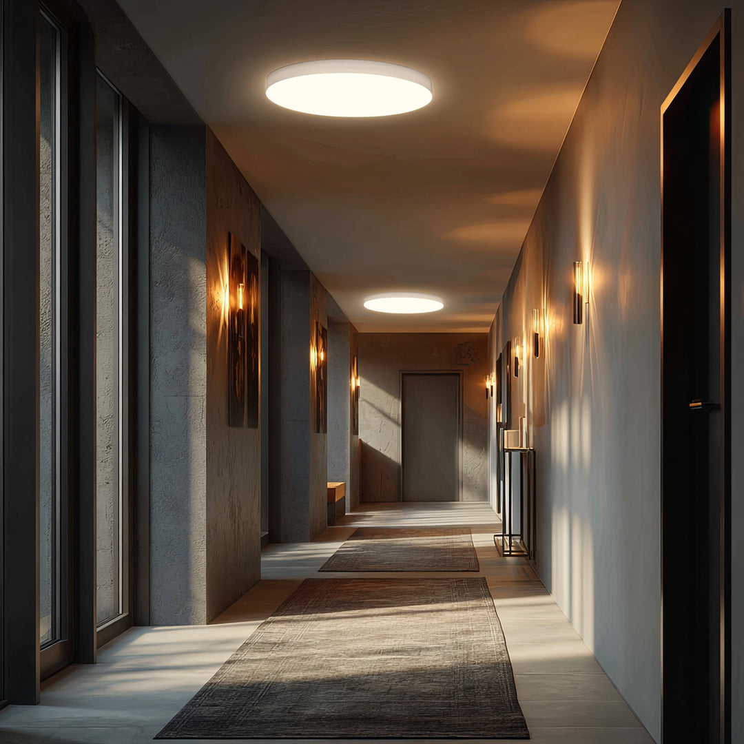 Maclean MCE347 ceiling LED sensor lamp. Equipped with a 5.8GHz microwave sensor, it emits a 4000K light with 12W power and 950lm brightness. With an IP44 rating, it ensures durability and reliability in various environments.