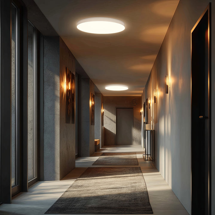 Maclean MCE347 ceiling LED sensor lamp. Equipped with a 5.8GHz microwave sensor, it emits a 4000K light with 12W power and 950lm brightness. With an IP44 rating, it ensures durability and reliability in various environments.