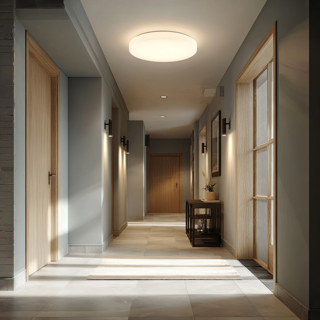 Maclean MCE347 ceiling LED sensor lamp. Equipped with a 5.8GHz microwave sensor, it emits a 4000K light with 12W power and 950lm brightness. With an IP44 rating, it ensures durability and reliability in various environments.