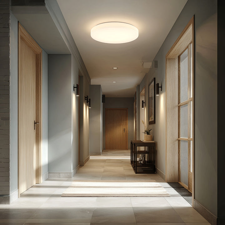 Maclean MCE347 ceiling LED sensor lamp. Equipped with a 5.8GHz microwave sensor, it emits a 4000K light with 12W power and 950lm brightness. With an IP44 rating, it ensures durability and reliability in various environments.