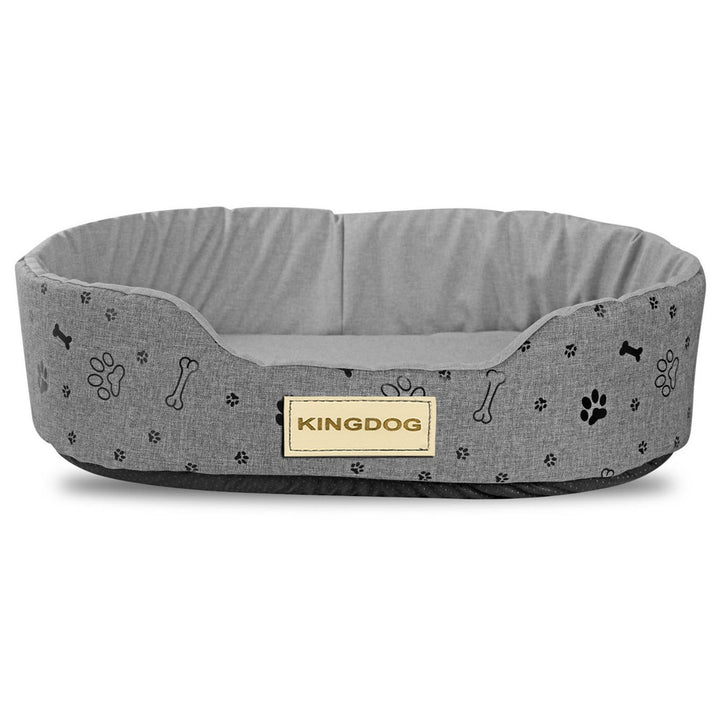 Kingdog lair, oval-shaped and crafted from durable codura material. Measuring 50x40cm, its sleek grey design accented with a stylish black pattern adds a touch of sophistication to your pet's resting space.