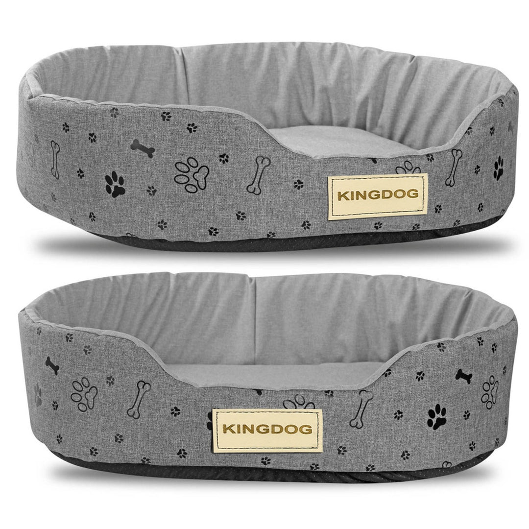 Kingdog lair, oval-shaped and crafted from durable codura material. Measuring 50x40cm, its sleek grey design accented with a stylish black pattern adds a touch of sophistication to your pet's resting space.