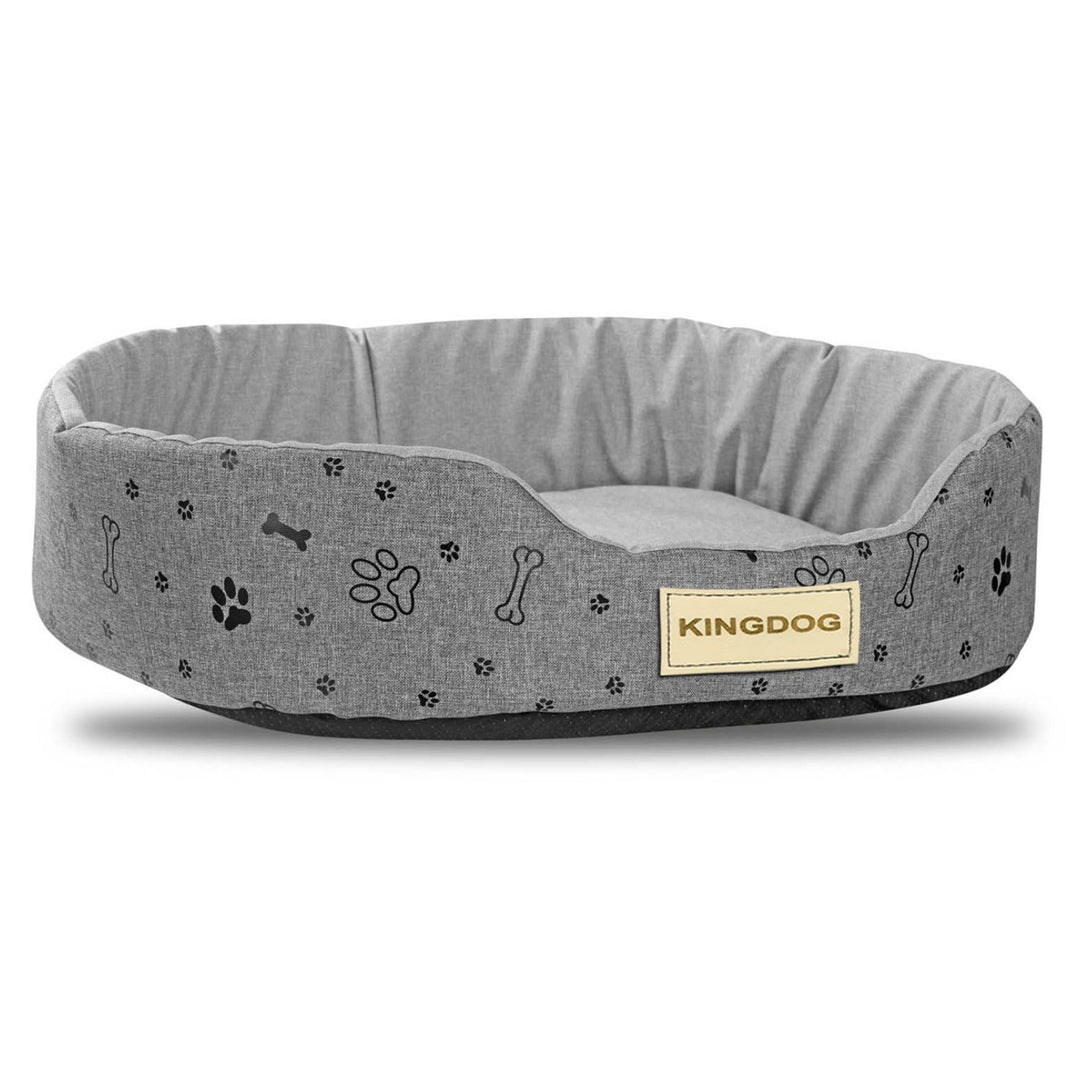 Kingdog lair, oval-shaped and crafted from durable codura material. Measuring 50x40cm, its sleek grey design accented with a stylish black pattern adds a touch of sophistication to your pet's resting space.