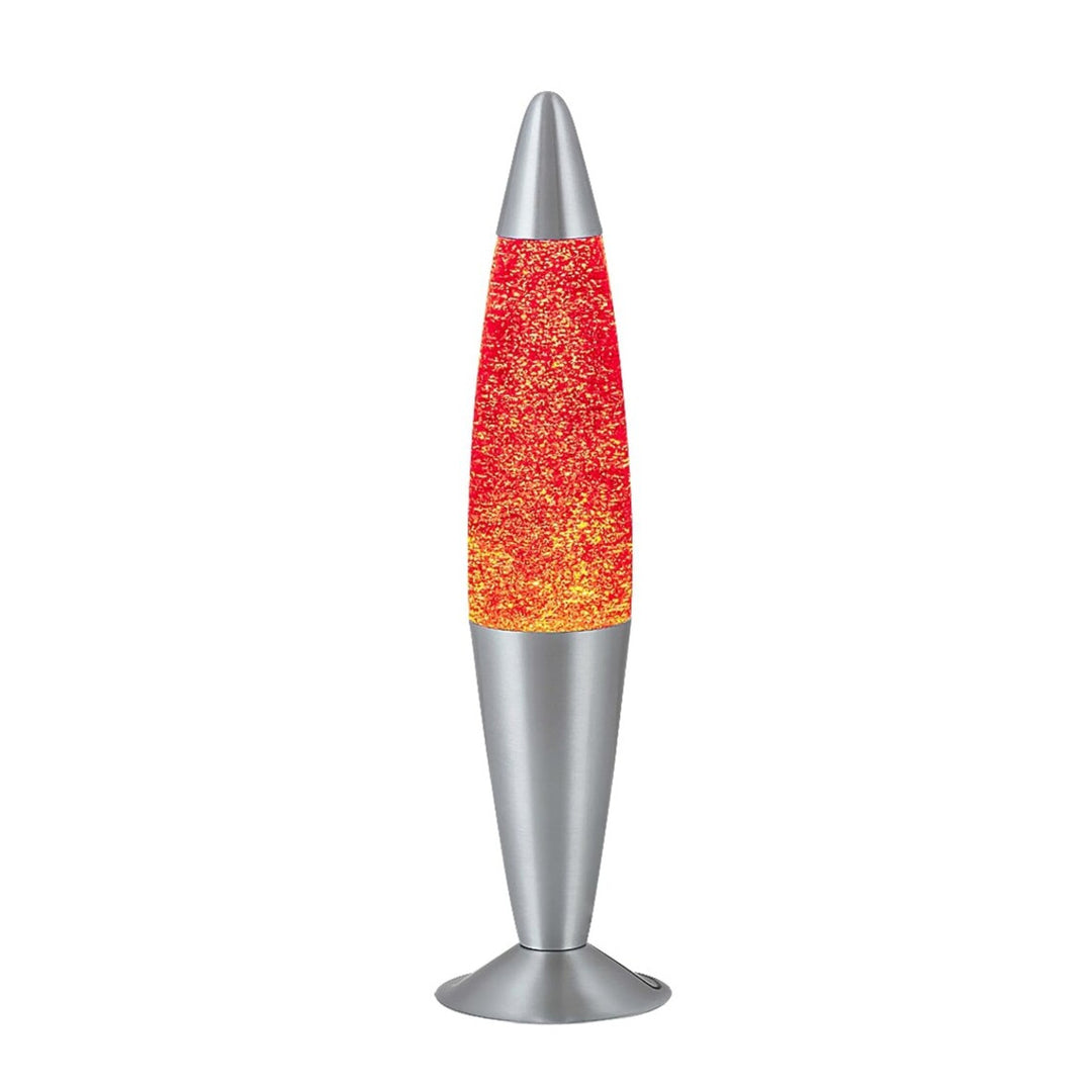 Introducing the Rabalux Glitter lava lamp: Radiating a warm orange glow, this lamp features mesmerizing glitter swirls, creating a captivating visual display. Powered by a 25W bulb, it combines retro charm with modern flair, adding a touch of enchant