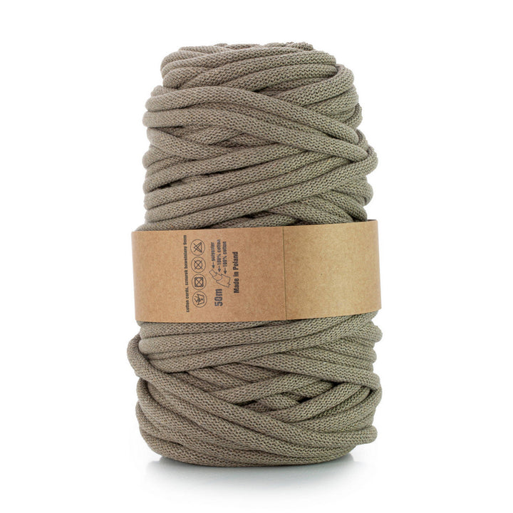 WAS offers a braided cotton cord with a polyester core, 9mm thick and 50m long, in a deep dark beige shade. Perfect for various applications, ensuring durability and timeless style.