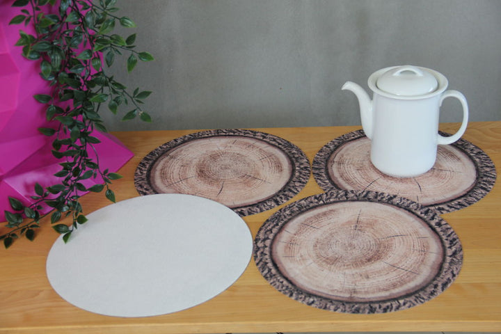 Bertoni table mat set, comprising 4 round mats, each measuring 33 cm in diameter. Elevate your dining ambiance with these chic Robina-colored mats, adding a dash of style to your table setup.