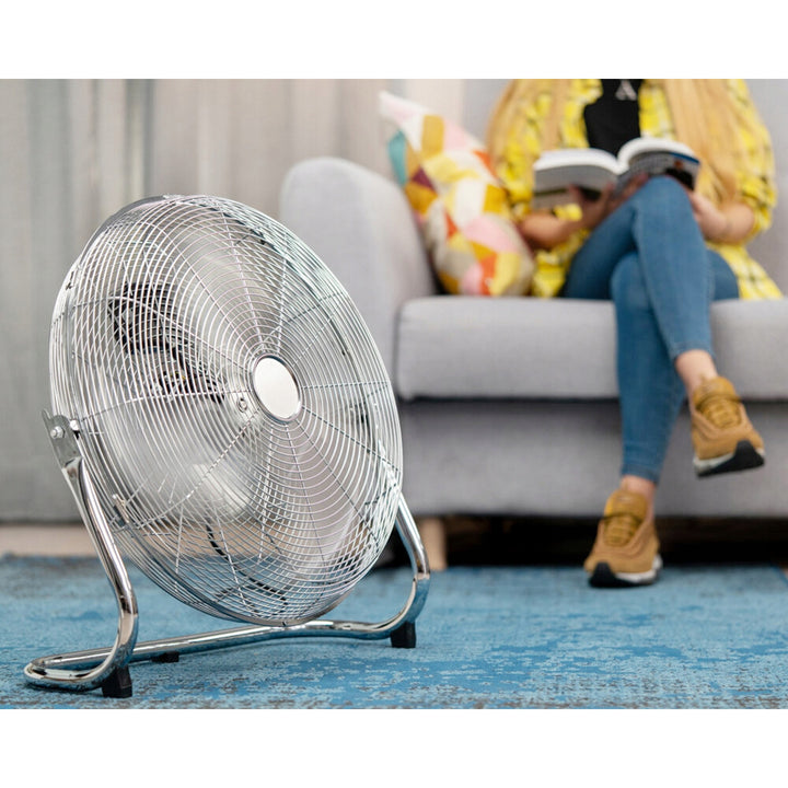 LTC LXWTP18 floor fan, boasting a powerful 120W motor and a circulator design for optimal air circulation. With three adjustable speeds, it offers versatile cooling options for your space.