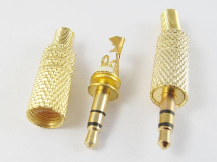 Plug a small 3.5mm stereo goldw jack with a metal housing
