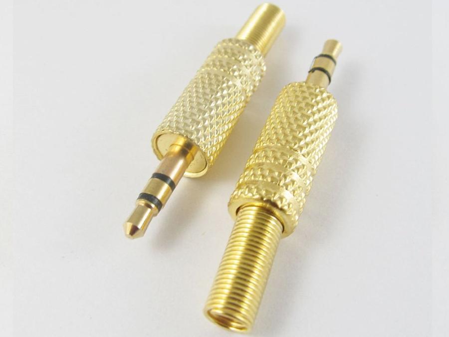 Plug a small 3.5mm stereo goldw jack with a metal housing