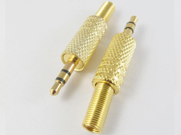 Plug a small 3.5mm stereo goldw jack with a metal housing
